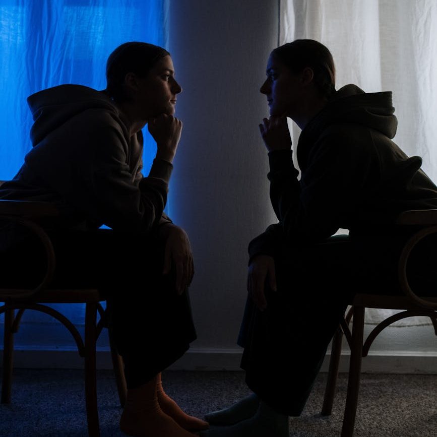 Picture of two people looking at each other, depicting introversion and extroversion